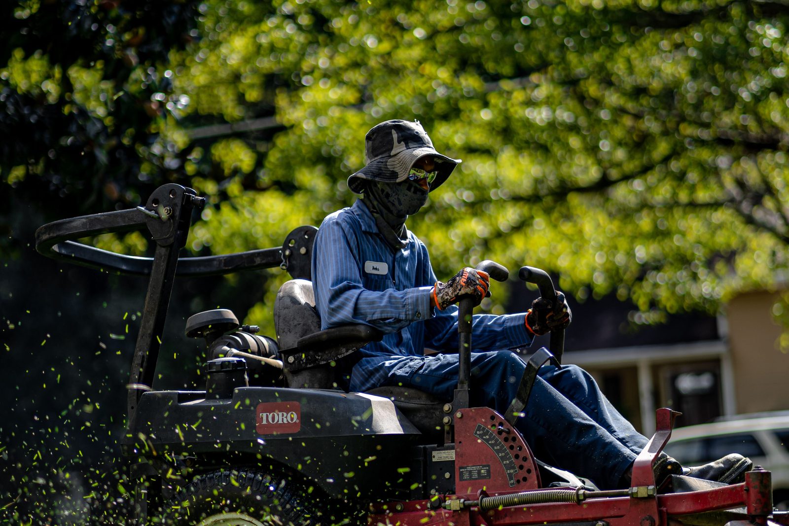 Kestrel mower and lettered truck on a job